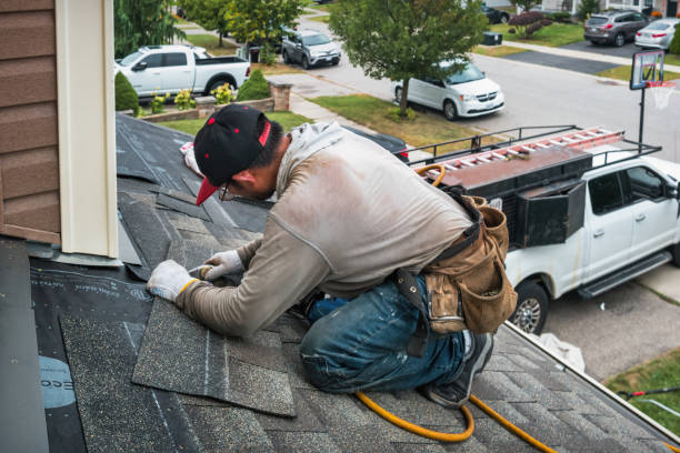Professional Roofing technician working in East Hampton, CT